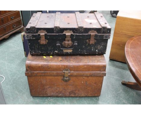 Brown tin trunk and another metal trunk