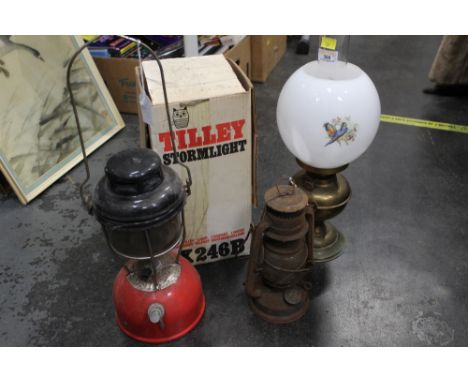 A lantern, tilly lamp and oil lamp 