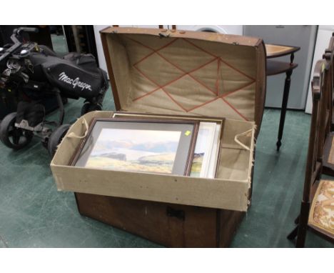Brown canvas dome topped trunk with carrying handles
