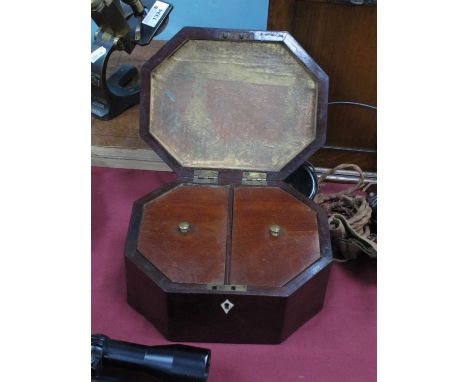 A Mid XIX Century Mahogany Inlaid Tea Caddy, of elongated octagonal form, the hinged lid with central medallion, bone key esc
