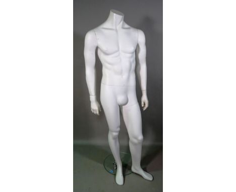 A 20th century shop display mannequin on circular chrome and glass base. 