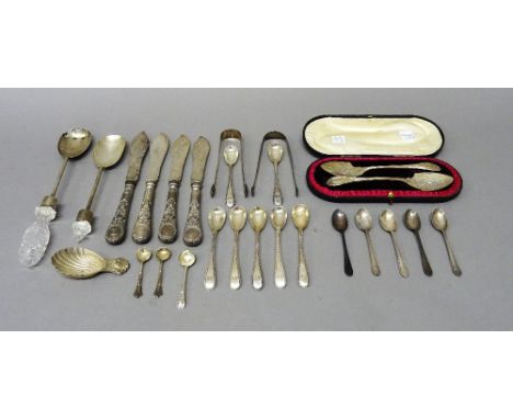 Silver flatware, comprising; a pair of Edwardian preserve spoons, each of spade form, with cast and engraved decoration, Shef