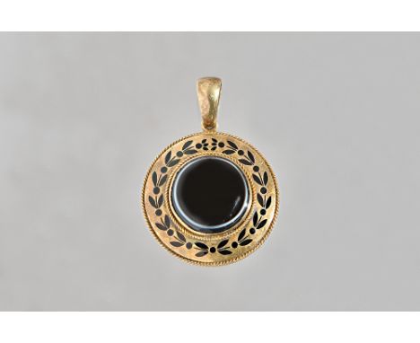 A Victorian gold, banded agate and black enamelled mourning pendant, of circular form, mounted with the banded agate to the c