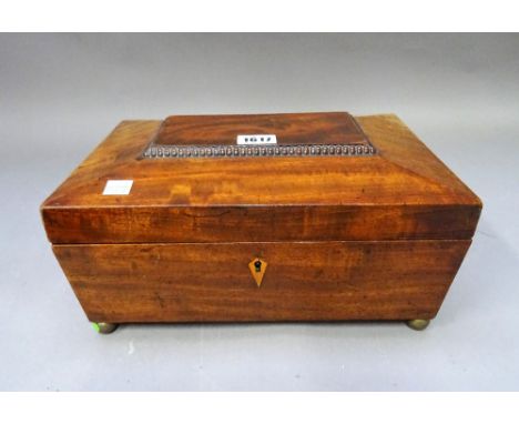 An early 19th century mahogany jewellery box of compressed octagonal form, 31cm wide x 14cm high, together with a Regency mah