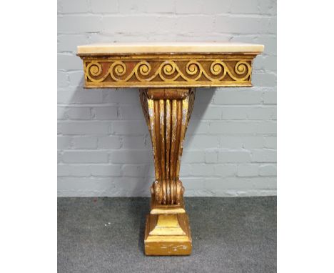 A 19th century console table of 18th century design, the marble top on a single gilt scroll base, 56cm wide x 80cm high.