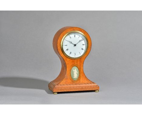 A French satinwood balloon shaped mantel clock, late 19th century, with white enamel dial over a waisted case, inset with a W