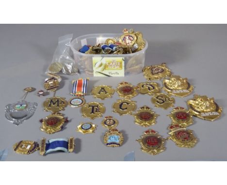 A Masonic regalia gilt metal and enamel chain collar, 20th century, with linked badges united by a relief cast 'bull' pendant