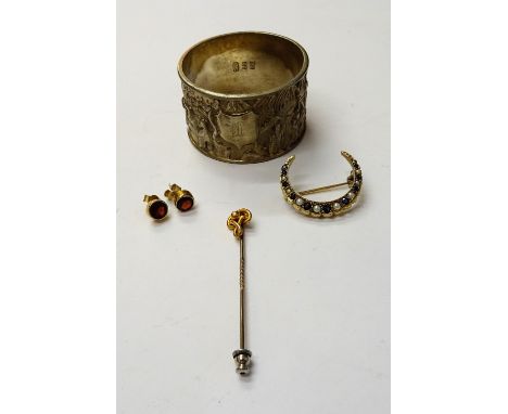 A 9ct gold, sapphire and cultured pearl brooch designed as a crescent, a gold topped stick pin, detailed 9 C, a pair of garne