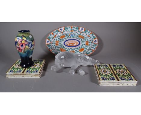 Ceramics, including; six decorated ceramic tiles, a Lalique model of an elephant, a Moorcroft vase, an oval plate decorated i