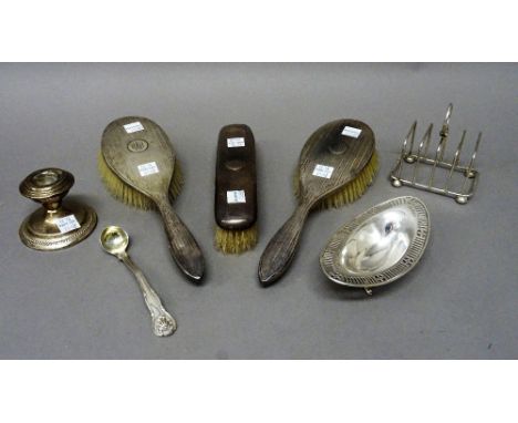 Silver and silver mounted wares, comprising; a five bar toastrack, with a loop shaped handle, Sheffield  1913, an oval bonbbo