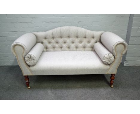 A Regency style small hump back sofa, on turned supports, 21st century, 140cm wide x 77cm high.