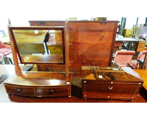 A Regency rosewood sarcophagus shaped twin division tea caddy and a 19th century rectangular swing frame mirror on a two draw