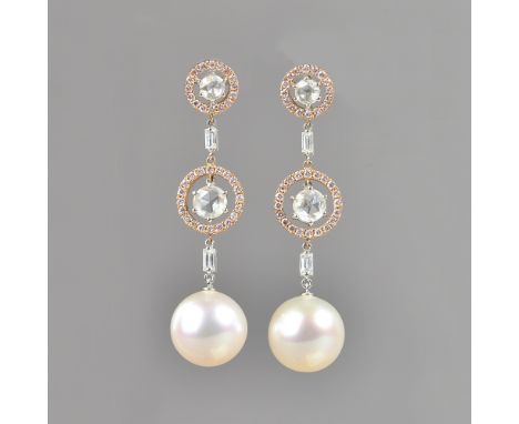 A pair of cultured pearl and diamond pendant earrings, the halo set principal rose cut diamonds suspending the large cutlured