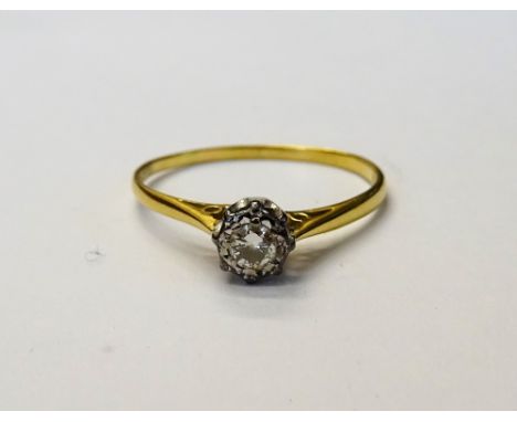 An 18ct gold and diamond set single stone ring, mounted with a circular cut diamond, London 1978, ring size R.