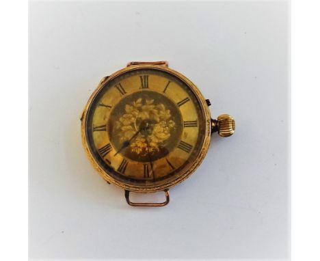 A lady's gold cased, keyless wind, openfaced fob watch, converted for wear as a wristwatch, with a gilt jewelled cylinder mov