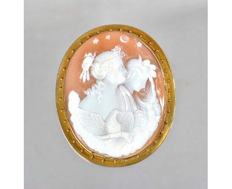 A Victorian gold mounted oval shell cameo brooch, carved as two classical female figures, with birds and clouds, within a bea