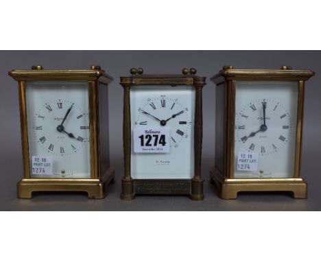 A French brass cased carriage clock, late 19th century, with visible platform escapement and white enamel dial detailed 'W. H