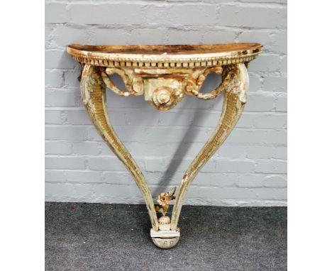 A 19th century white painted console table with swag frieze, 63cm wide x 85cm high. 