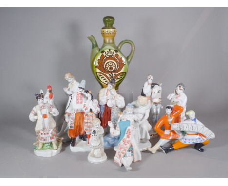 Ten Russian ceramic figures and a Russian pottery teapot, (11). 