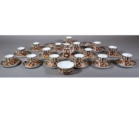 A Royal Crown Derby Imari decorated part tea service, red printed marks, comprising; fourteen matched coffee cans, eighteen m