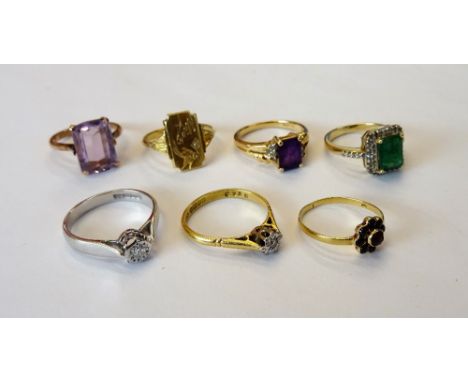 An 18ct gold and diamond set single stone ring, mounted with a circular cut diamond, a 9ct white gold and diamond set single 