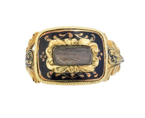 A William IV 18ct gold mourning ring, the glazed hairwork panel within a black enamel surround and scrolling tapered shoulder