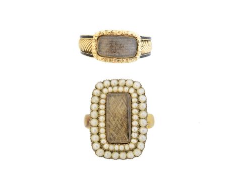 Two late Victorian mourning rings, each with a rectangular glazed hairwork panel, the first with black enamel and grooved ban