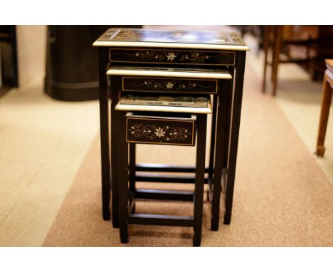 MID 20TH CENTURY CHINESE LACQUERED CABINETwith two drawers above a two door cupboard, with mother of pearl figures in relief,