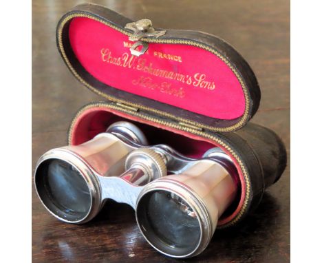 Cased pair of Mother of Pearl opera glasses by Charles W. Schmanns + Sons, New York Used condition, not tested for working