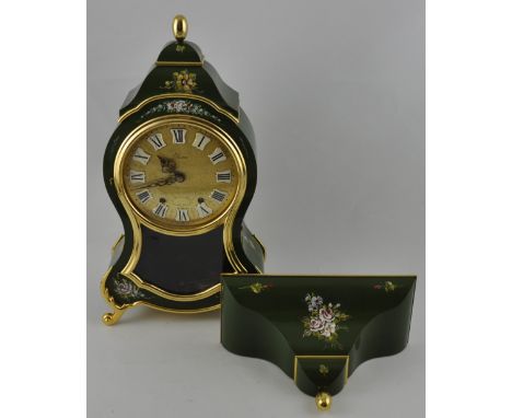 A 1970's Harrods retailed Eluxa Louis XVI-style brass mounted green lacquered clock with hand-painted floral decoration on sc