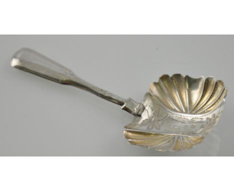 A George III silver caddy spoon with engraved and embossed rectangular bowl, James Collins, Birmingham 1824