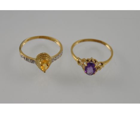 A 9ct pear cut citrine and diamond ring together with a 9ct oval amethyst and diamond ring