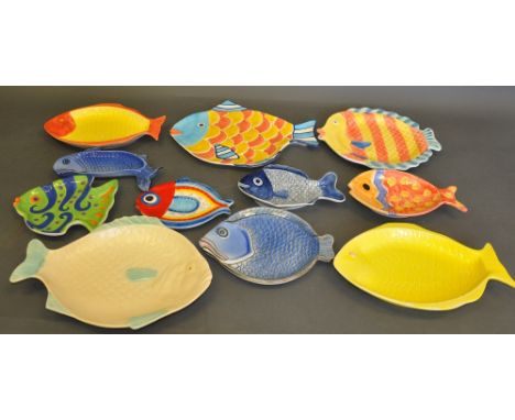 A plethora of piscine platters: eleven various glazed ceramic plates and dishes modelled as fish, including a 1930s Shorter a