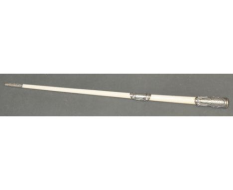 An Edwardian silver mounted ivory swagger stick, the embossed mount with engraved dedication, 'presented to Fleet Haymaster, 