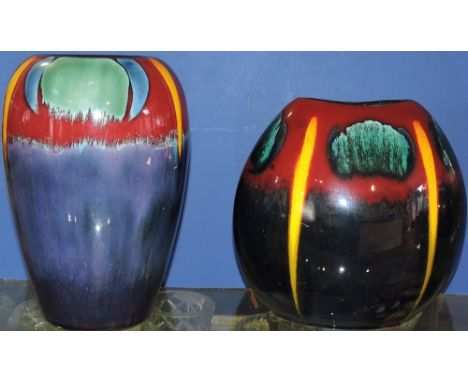 A Poole Pottery Infusion pattern baluster shaped vase, the body of iridescent blue with a red band to the top with splashes o