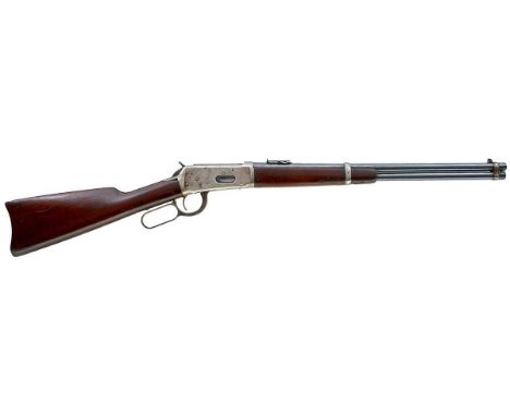 20inch sighted round barrel with full length tube magazine, fitted with rear ladder sights, the steel action with saddle ring