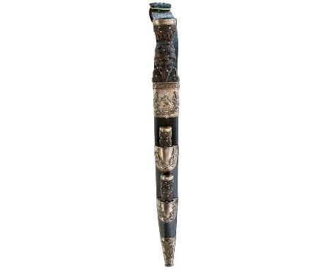 29.25cm fullered blade with faceted back edge, characteristic white metal mounted hilt decorated with thistles, the pommel se