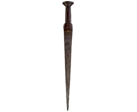 31.75cm blade, double edged towards the tip, characteristic carved wooden hilt with rounded shoulders, decorated with a lower