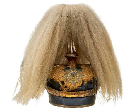 the black leather skull with gilt brass fittings, the Prussian eagle helmet plate with central white metal rayed star boss, c