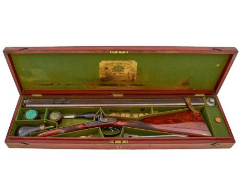 29.75inch sighted browned damascus barrels, fitted with a rear pivoting peep sight and engraved CHAS. J. SMITH LONDON on the 
