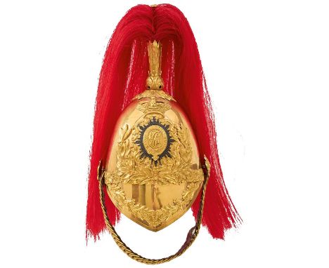 the gilt skull with gilt metal mounts, crowned rococo plate with central white metal faceted rayed star with central garter K