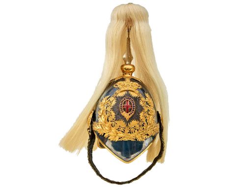 the plated skull with gilt metal mounts, to include laurel and oak leaf headband, faceted white metal rayed star helmet plate