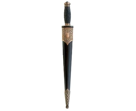 26cm flattened diamond section blade etched THE IRISH CUTLERY MFG. CO., characteristic silver mounted hilt decorated with Cel