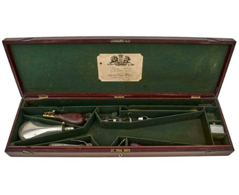 the green baize lined interior for a single barrelled rifle of approximately 30inches, the lid with maker's trade label for 3