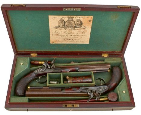 10inch sighted browned damascus octagonal barrels, case colour hardened platinum lined breeches decorated with scrolling foli
