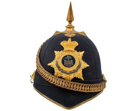 the blue cloth body with gilt and brass mounts, to include gilt crowned rayed star helmet plate with central laurel wreath mo