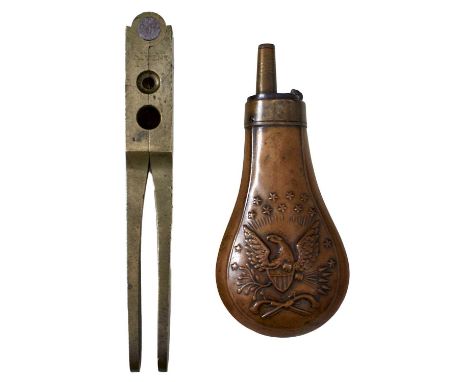 the brass body and arms stamped COLTS PATENT, apertures for bullet and ball, together with an American copper pistol flask of
