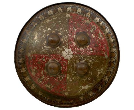 36.5cm diameter domed body with turned rim, four central domed bosses, the whole decorated with quadranted panels decorated w