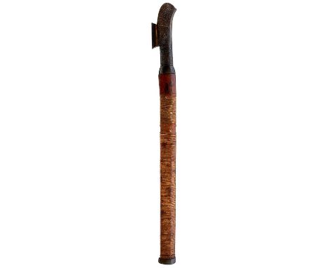 41cm deeply grained pamor blade, characteristic carved wooden hilt decorated with panels of scrolling geometric designs, brai