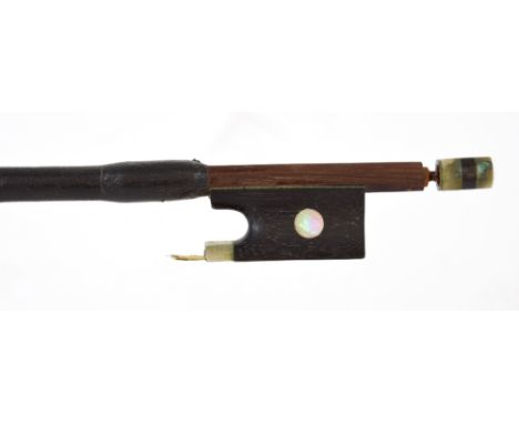 English nickel mounted violin bow by and branded R.R. Shields, the stick octagonal, the ebony frog inlaid with large pearl ey